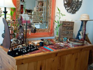 Cocktail rings, straw hats, and leather cuffs are among Thrive’s offerings of fair trade jewelry and accessories.